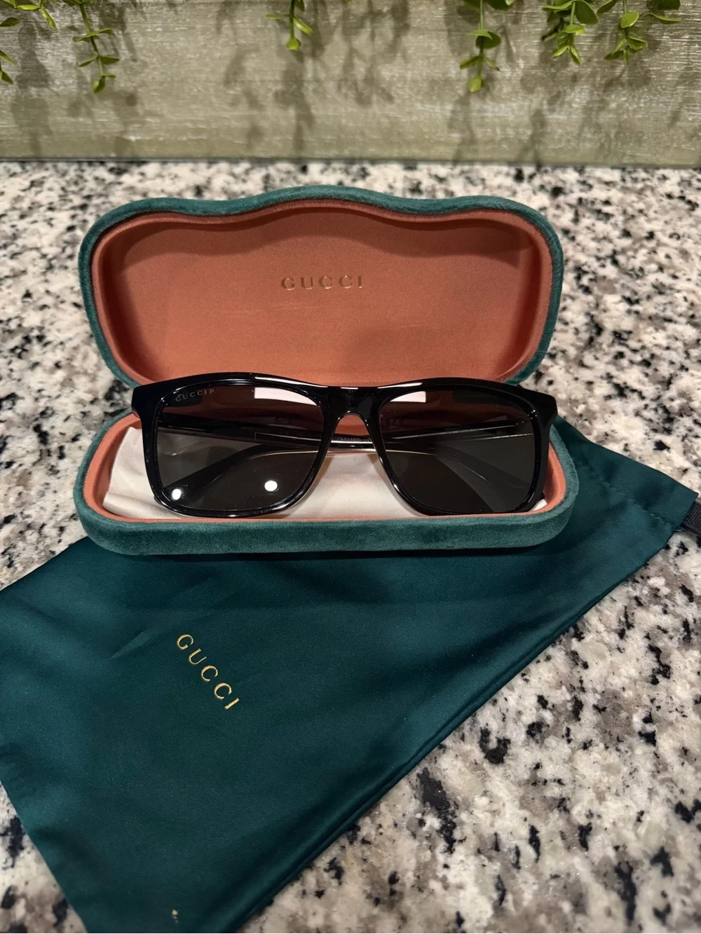 Gucci Black Frame Sunglasses with Teal Case Interior